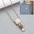 Elegant Gold Tone Necklace with Shimmery White and Grey Square Stones (