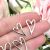Sterling Silver Jewellery: Larger Version Stretched Heart Outline Stud Earrings (12mm x 21mm) (E744)